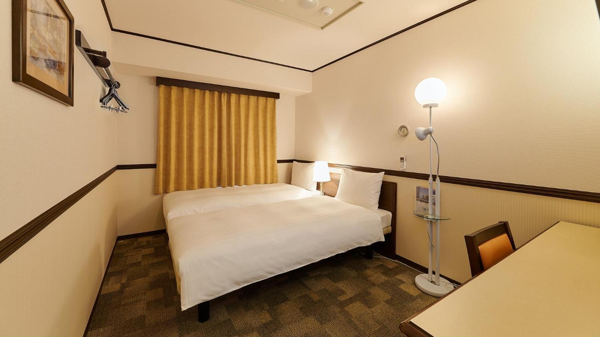 Toyoko Inn Osaka Itami Airport Toyonaka Zimmer foto