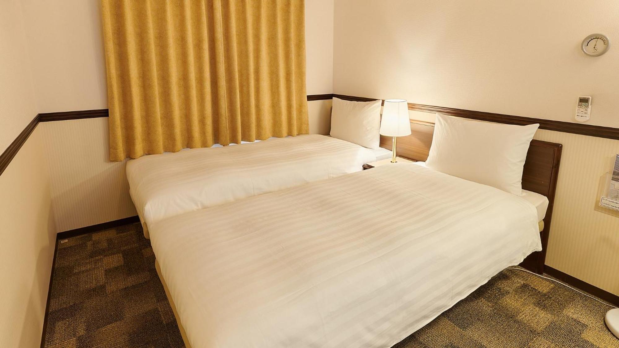 Toyoko Inn Osaka Itami Airport Toyonaka Zimmer foto