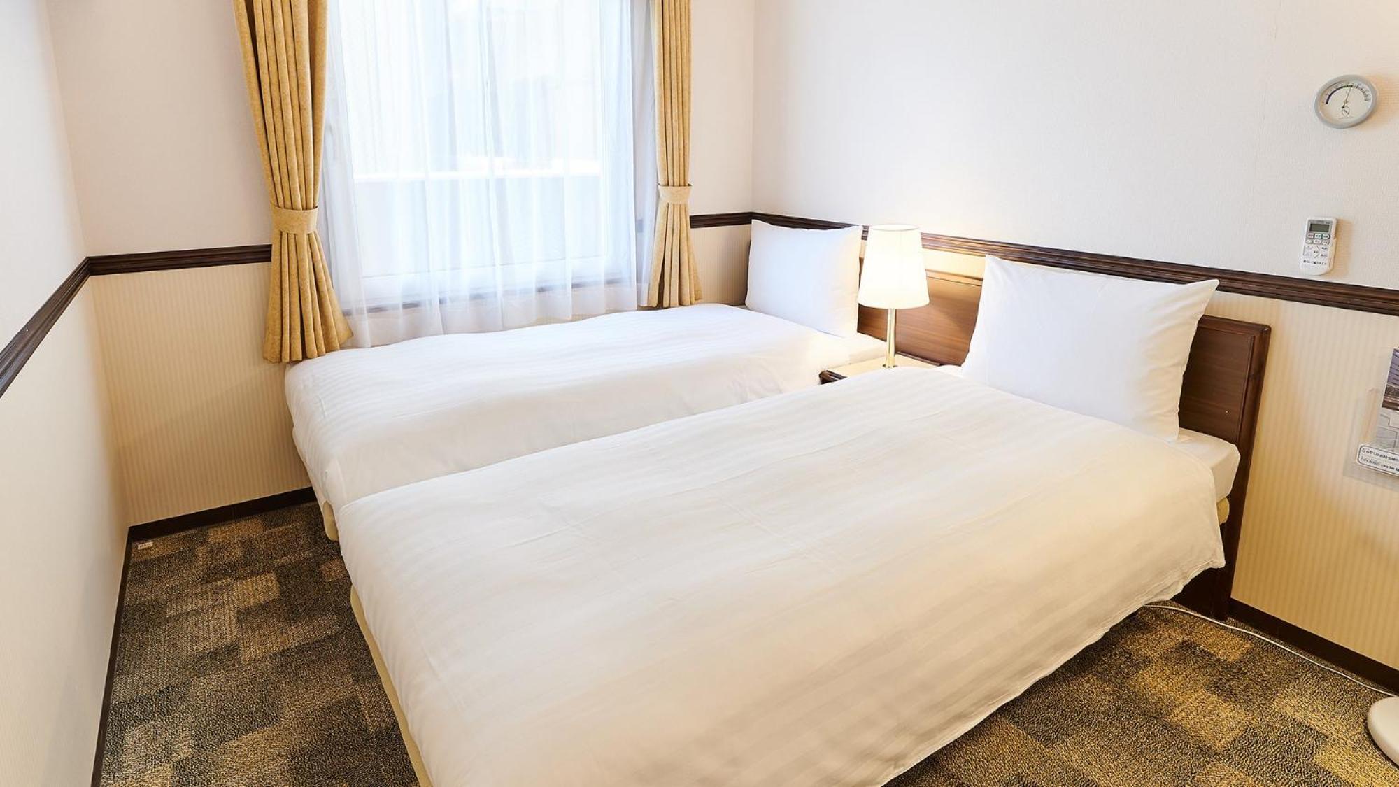 Toyoko Inn Osaka Itami Airport Toyonaka Zimmer foto
